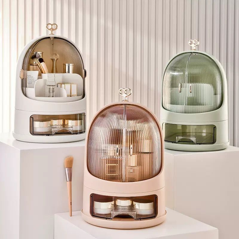 Organizer cosmetici con base bianca e cupola trasparente, cassetti e rotazione 360°