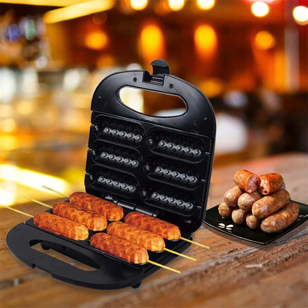 Macchina per hot dog doppia faccia nera con piastre e hot dog disposti