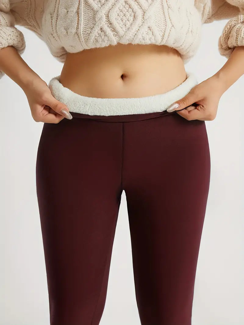 Leggings imbottiti rosso scuro con cintura in pile bianco