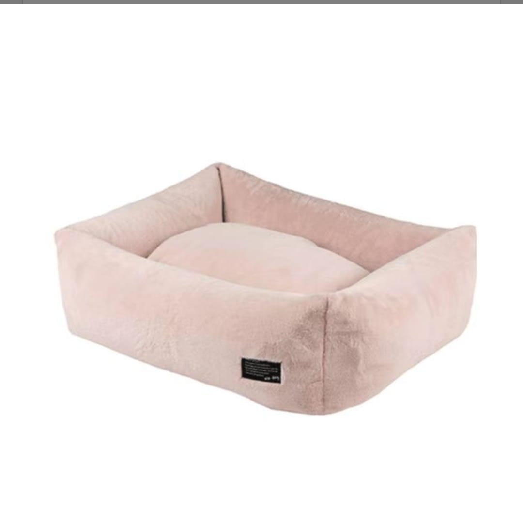 Cuccia morbida per cani e gatti in pile rosa chiaro, con bordo rialzato ed etichetta