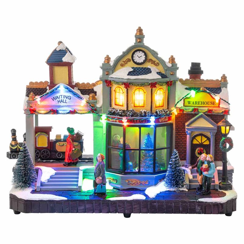 Stazione natalizia in miniatura con luci LED, movimento e personaggi su base in mattoni