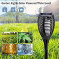 Lampioncino solare LED nero con picchetto, pannello solare e griglia effetto fiamma