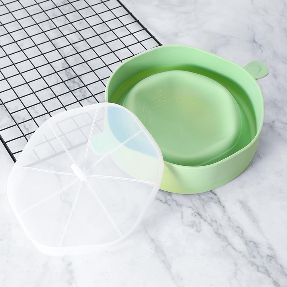Ciotola pieghevole in silicone verde chiaro con coperchio trasparente aperto e manici