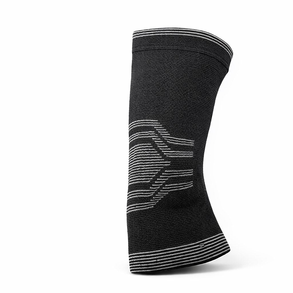 Cavigliera nera in tessuto tecnico con grafica a chevrons bianchi e bordo elastico