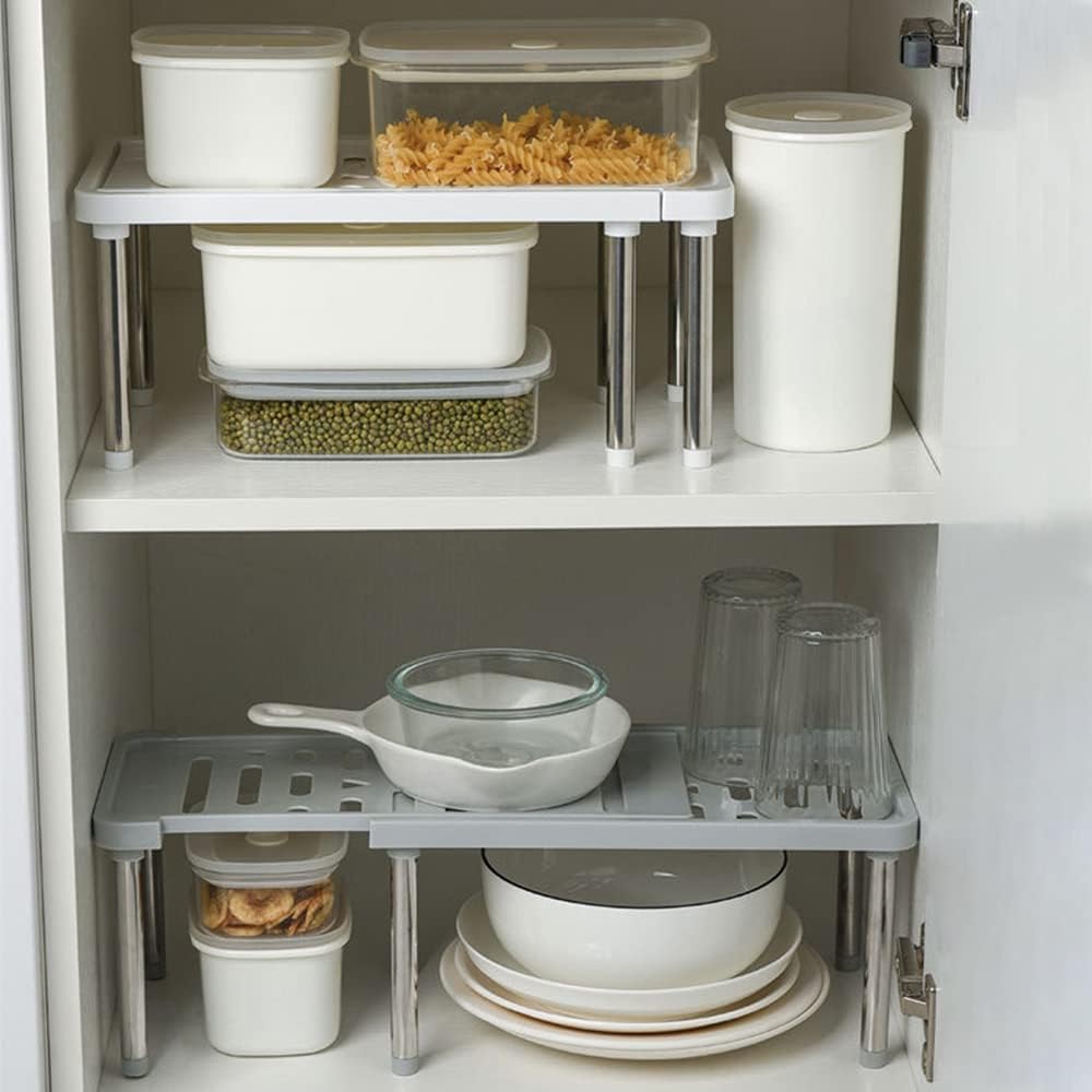 Scaffale pieghevole da cucina con ripiani grigi e gambe metalliche