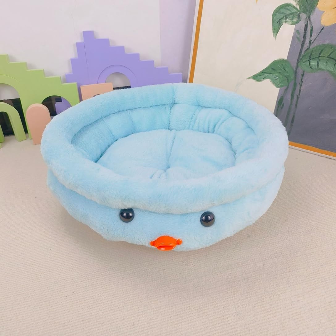 Cuccia tonda per animali in peluche azzurro con occhi e beccuccio arancione