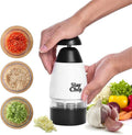 Spremiaglio manuale Slap Chop bianco e nero con coperchio nero superiore