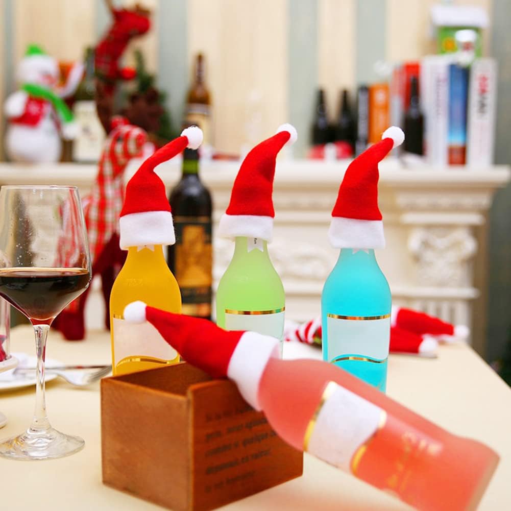 Mini cappelli di Babbo Natale rossi con bordo bianco e pon-pon, decorazione su bottiglie