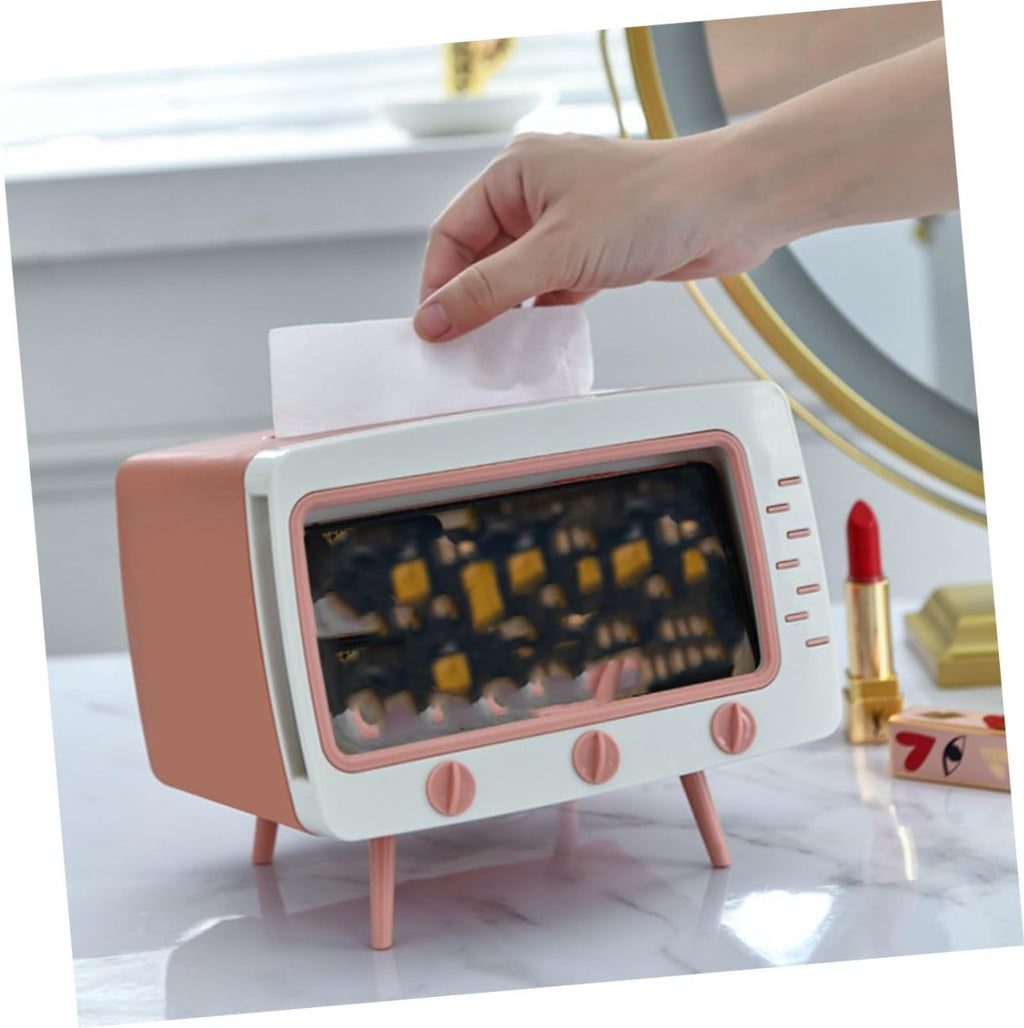 Porta fazzoletti a forma di TV bianco e rosa, mano inserisce un fazzoletto superiore