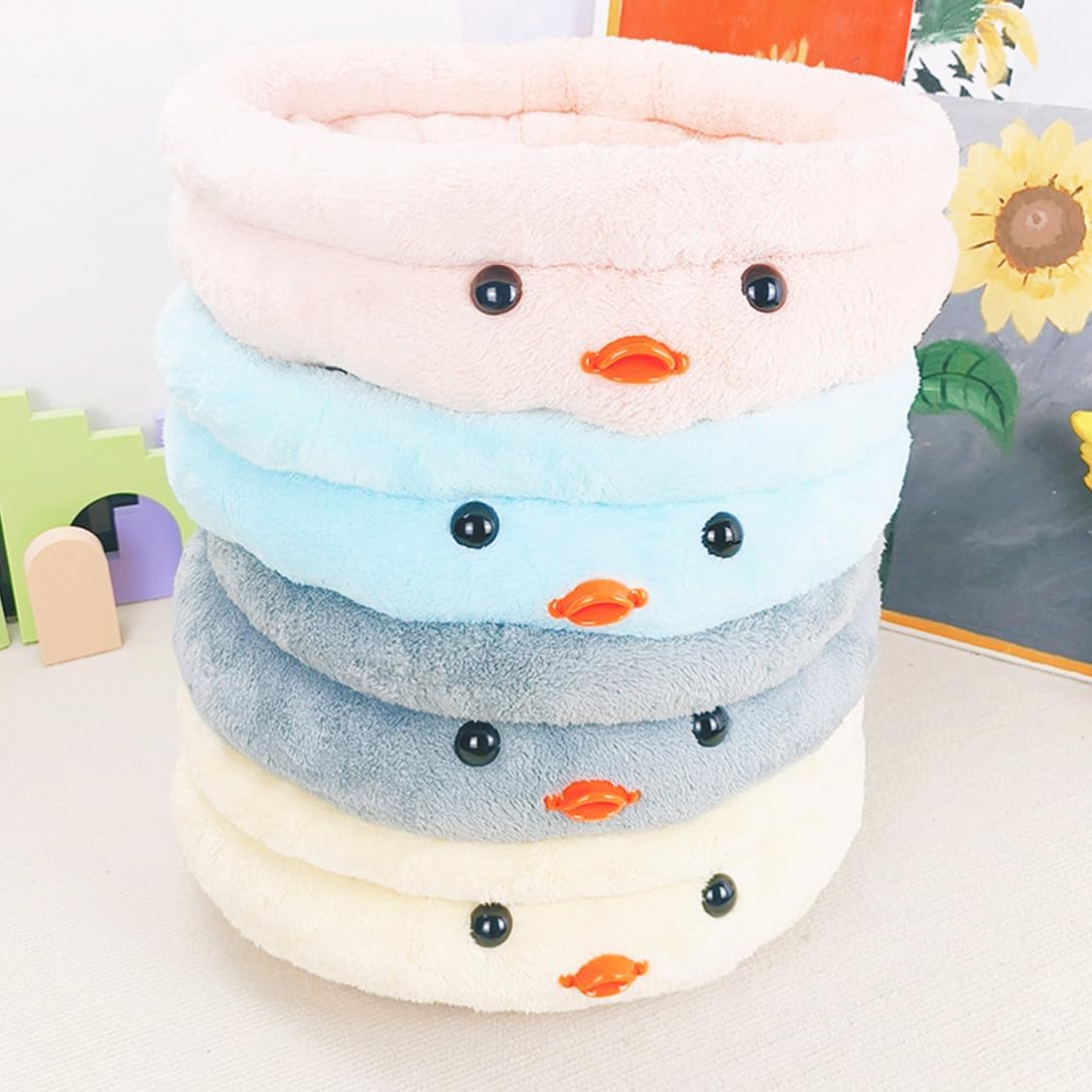 Cuccia tonda per animali in peluche multistrato bianco e blu con occhi e beccuccio arancione