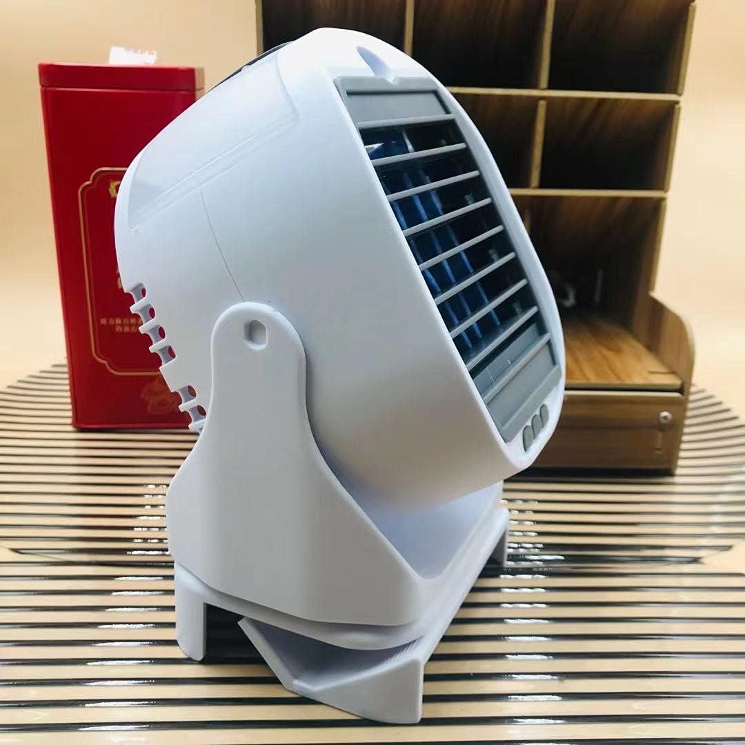 Mini condizionatore portatile bianco, vista laterale inclinata con griglia frontale