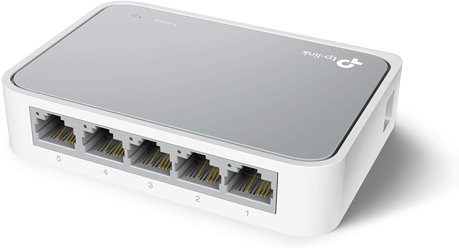 Switch desktop TP-Link 5 porte RJ45 visibili lateralmente, coperchio superiore grigio