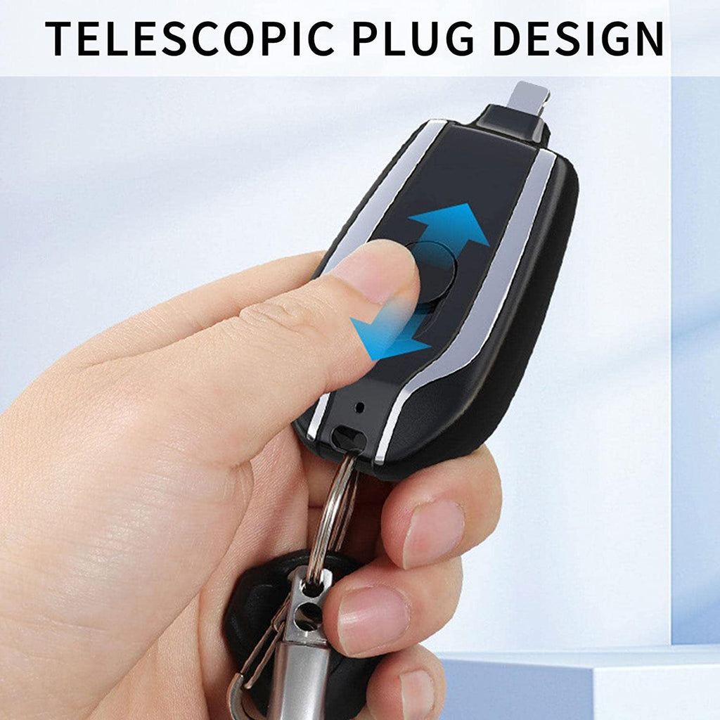 Power bank mini nero portachiavi con connettore USB‑C collegato al telefono