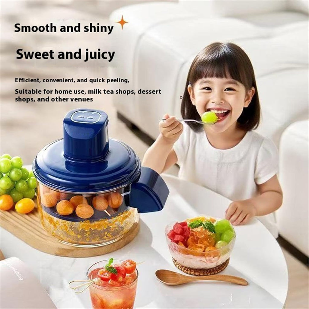 Sbucciatrice elettrica blu con ciotola trasparente e frutta arancione