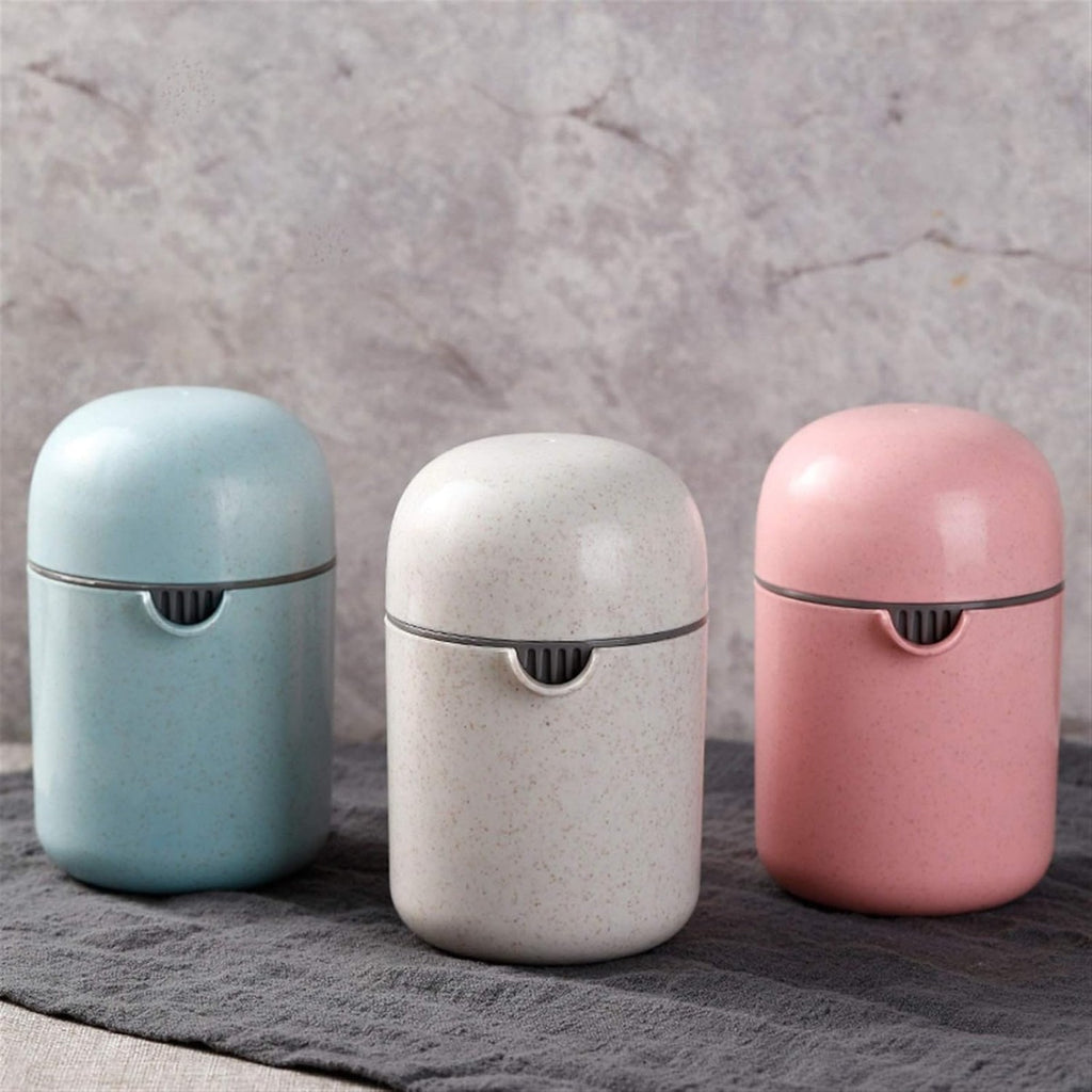 Spremiagrumi manuale portatile, tre colori pastello (azzurro, bianco, rosa)