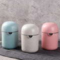 Spremiagrumi manuale portatile, tre colori pastello (azzurro, bianco, rosa)