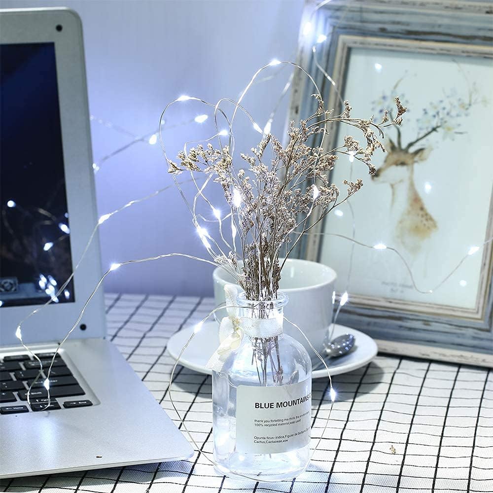 Luci natalizie a filo con 300 LED bianchi, su rami in vaso trasparente