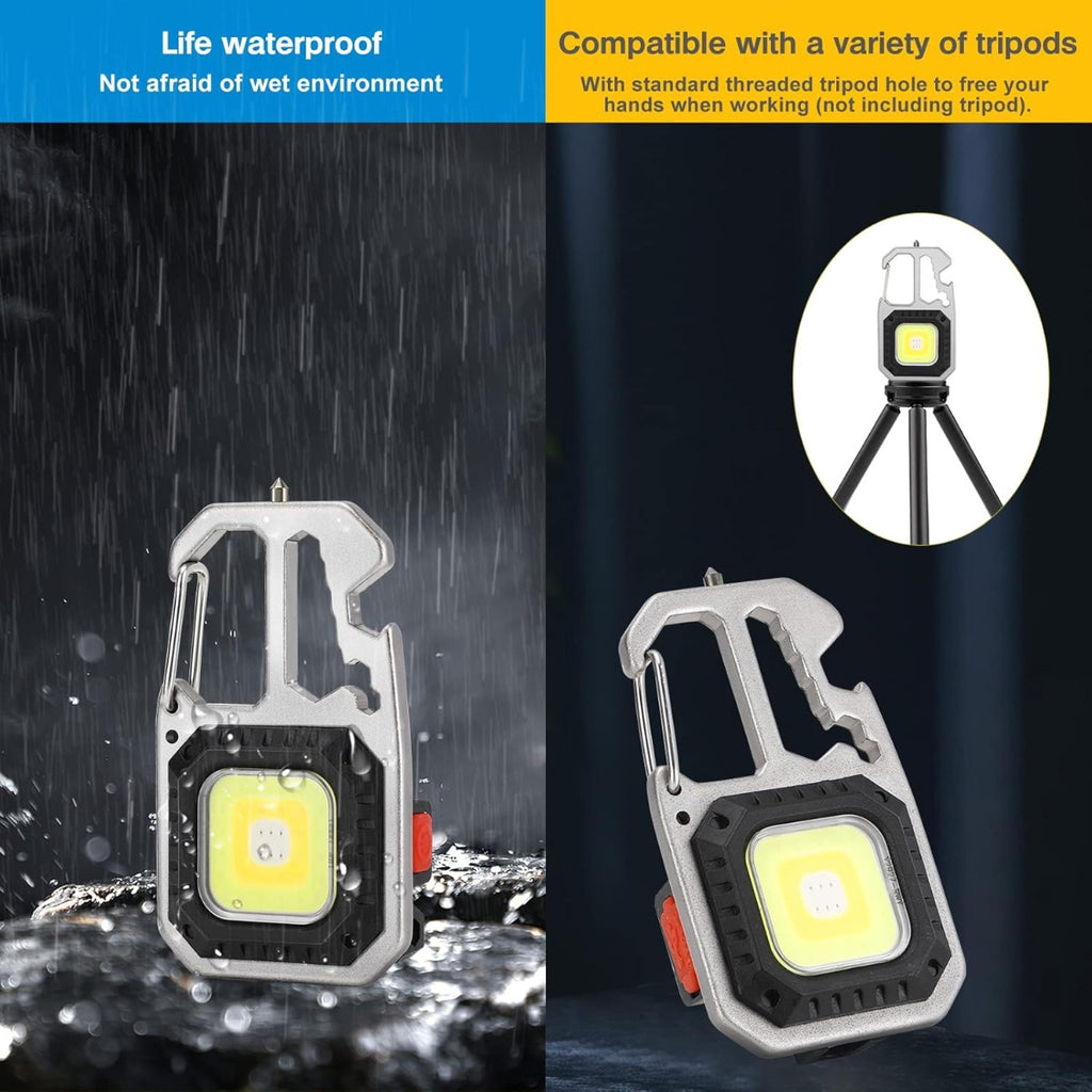 Torcia portachiavi mini COB LED, corpo argento e nero, con schizzi d’acqua
