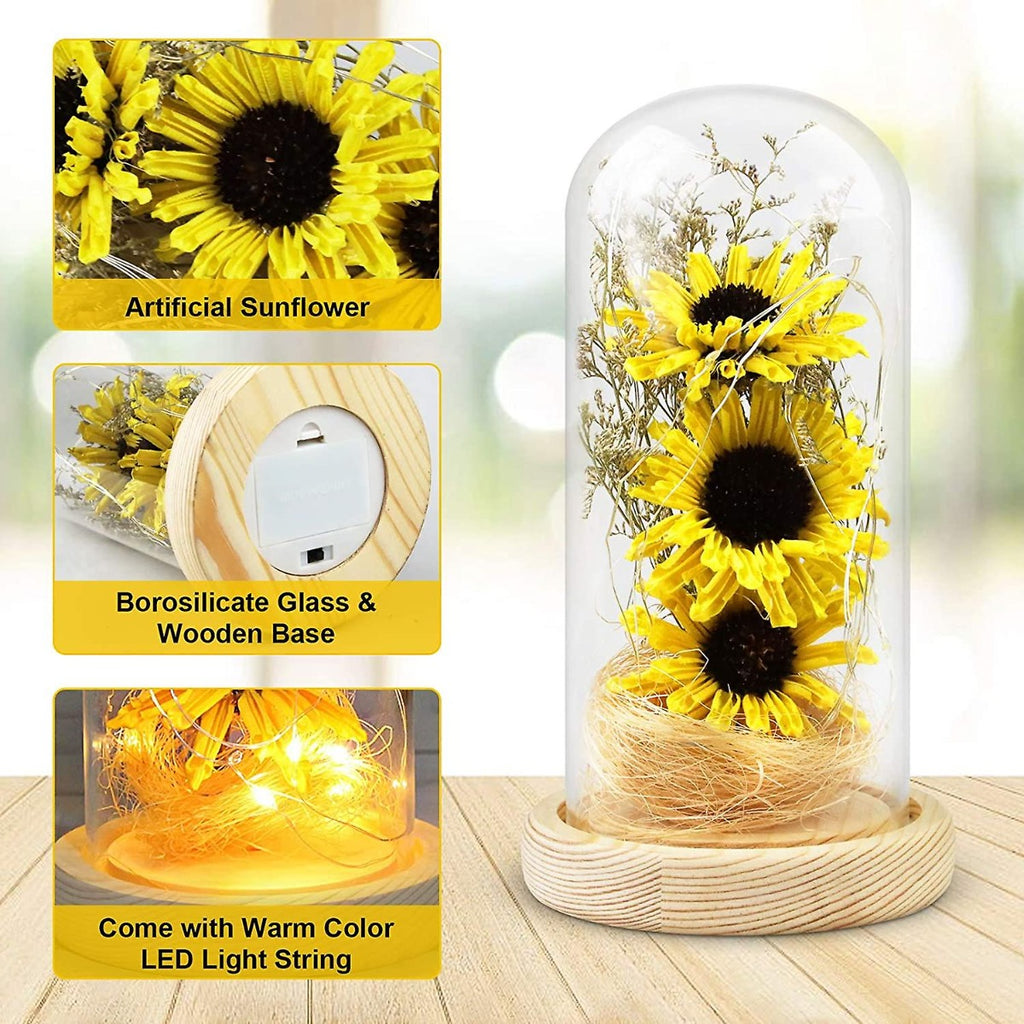 Cupola di vetro con girasoli artificiali gialli e base in legno con interruttore