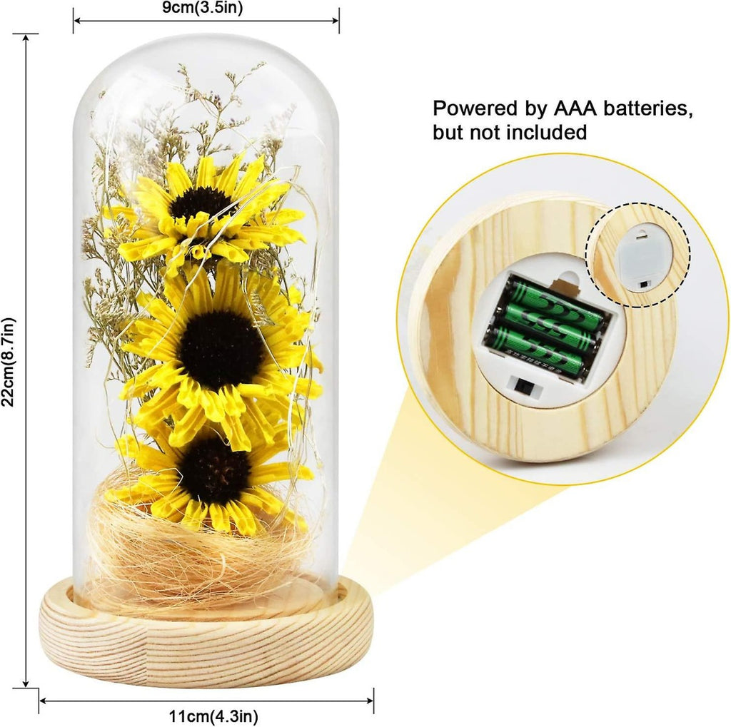 Cupola di vetro con girasoli artificiali gialli e base in legno