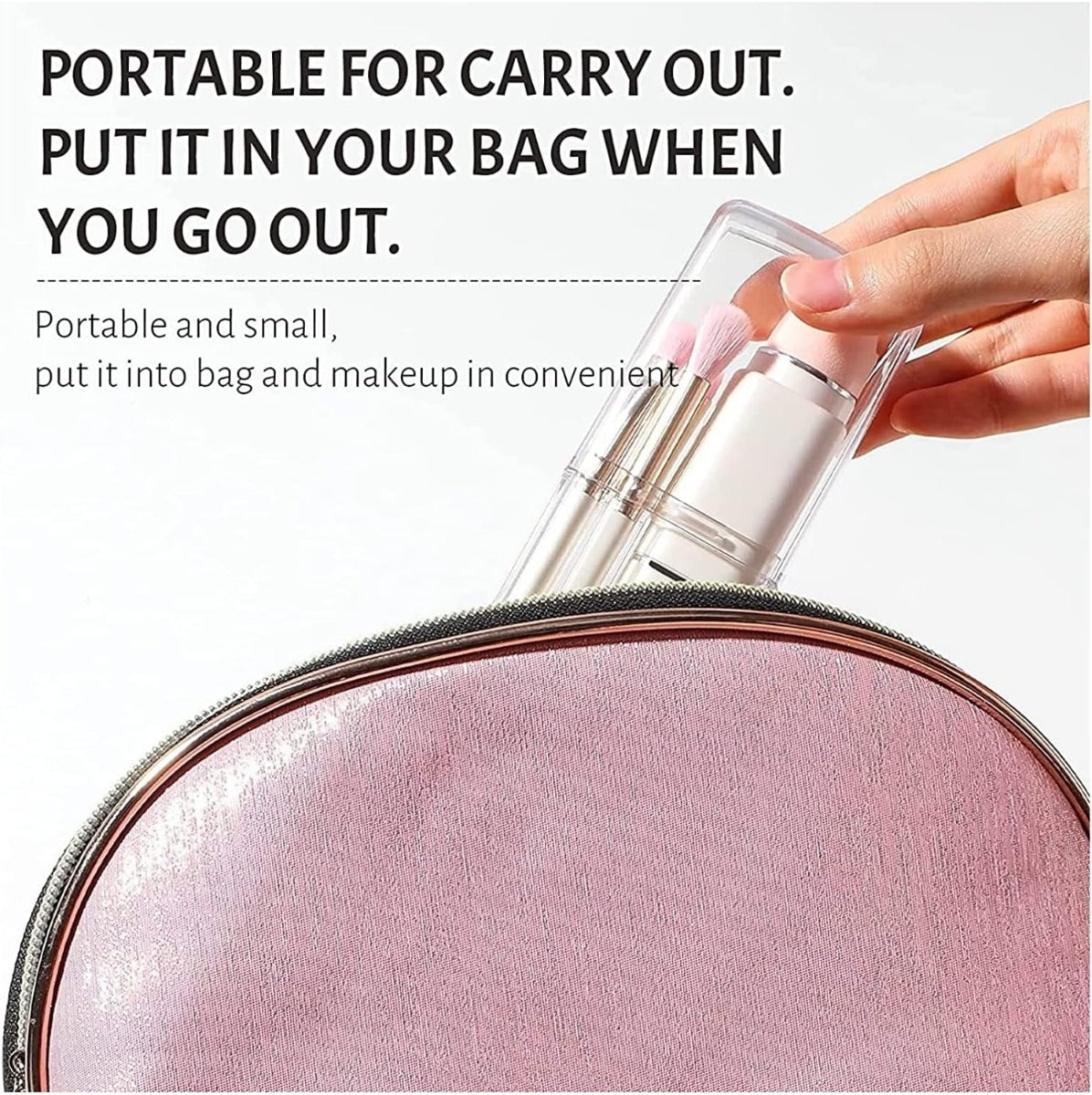 Pennello da trucco retrattile con setole rosa in astuccio trasparente, mano
