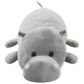 Peluche ippopotamo grigio con muso grande, occhi tondi e orecchie a punta.