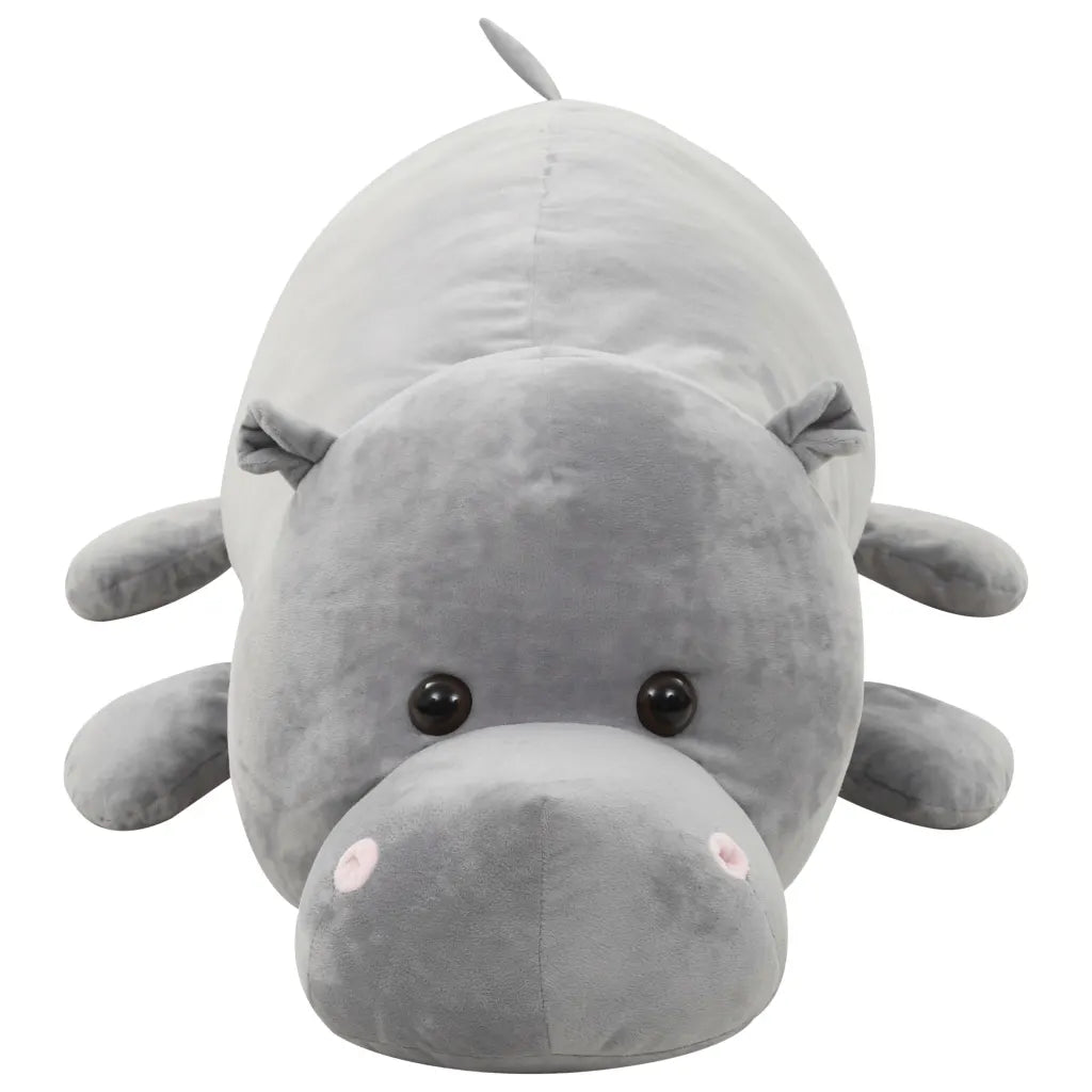 Peluche ippopotamo grigio con muso grande, occhi tondi e orecchie a punta.