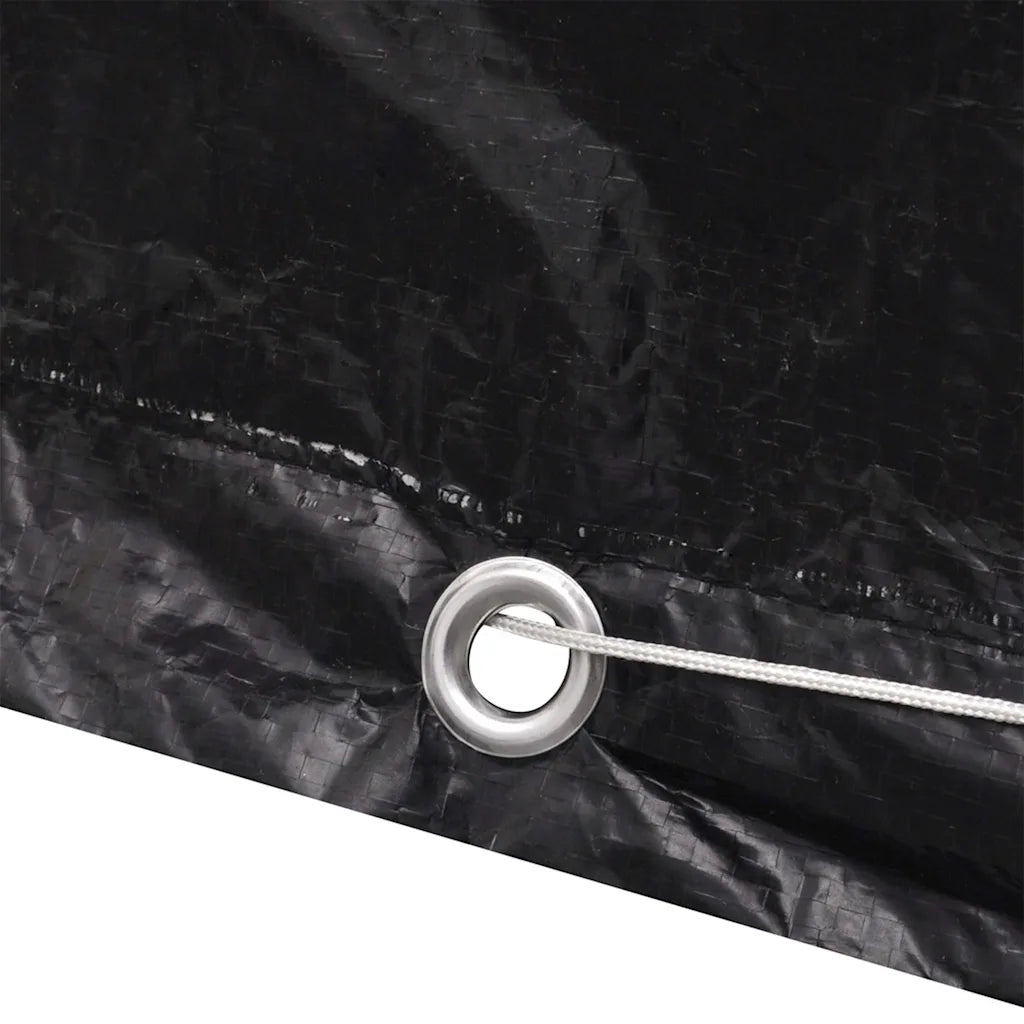 Occhiello metallico rotondo sulla copertura nera con corda intrecciata