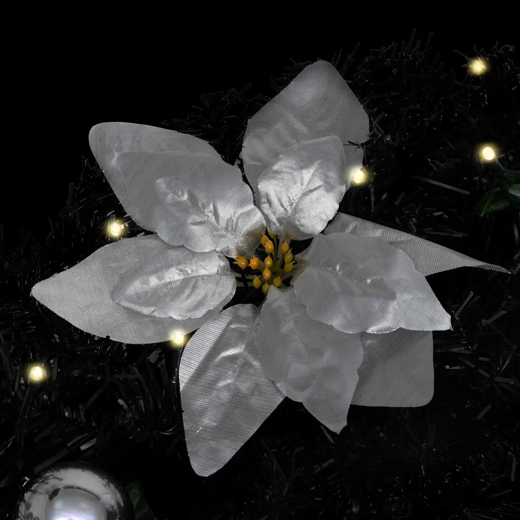Fiore natalizio bianco con centro giallo su ghirlanda nera con luci LED