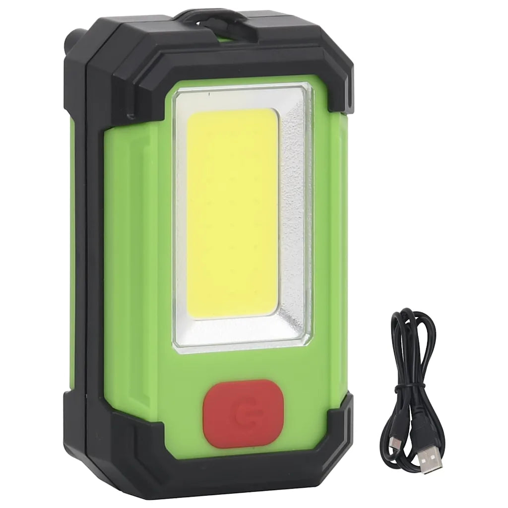 Faretto solare LED portatile verde/nero con pannello e cavo USB.