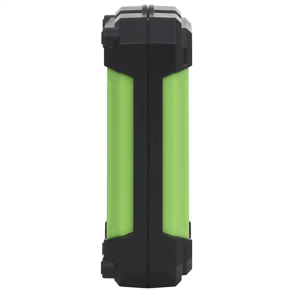 Faretto solare LED portatile visto di lato, corpo verde e base nera.