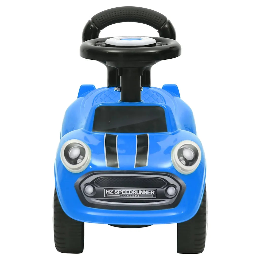 Auto cavalcabile blu per bambini con volante e luci anteriori circolari, ruote nere.