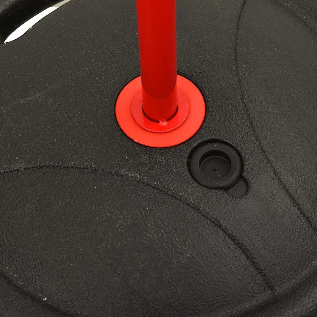 Base rotonda del canestro: base rossa e pulsante nero sul basamento nero.