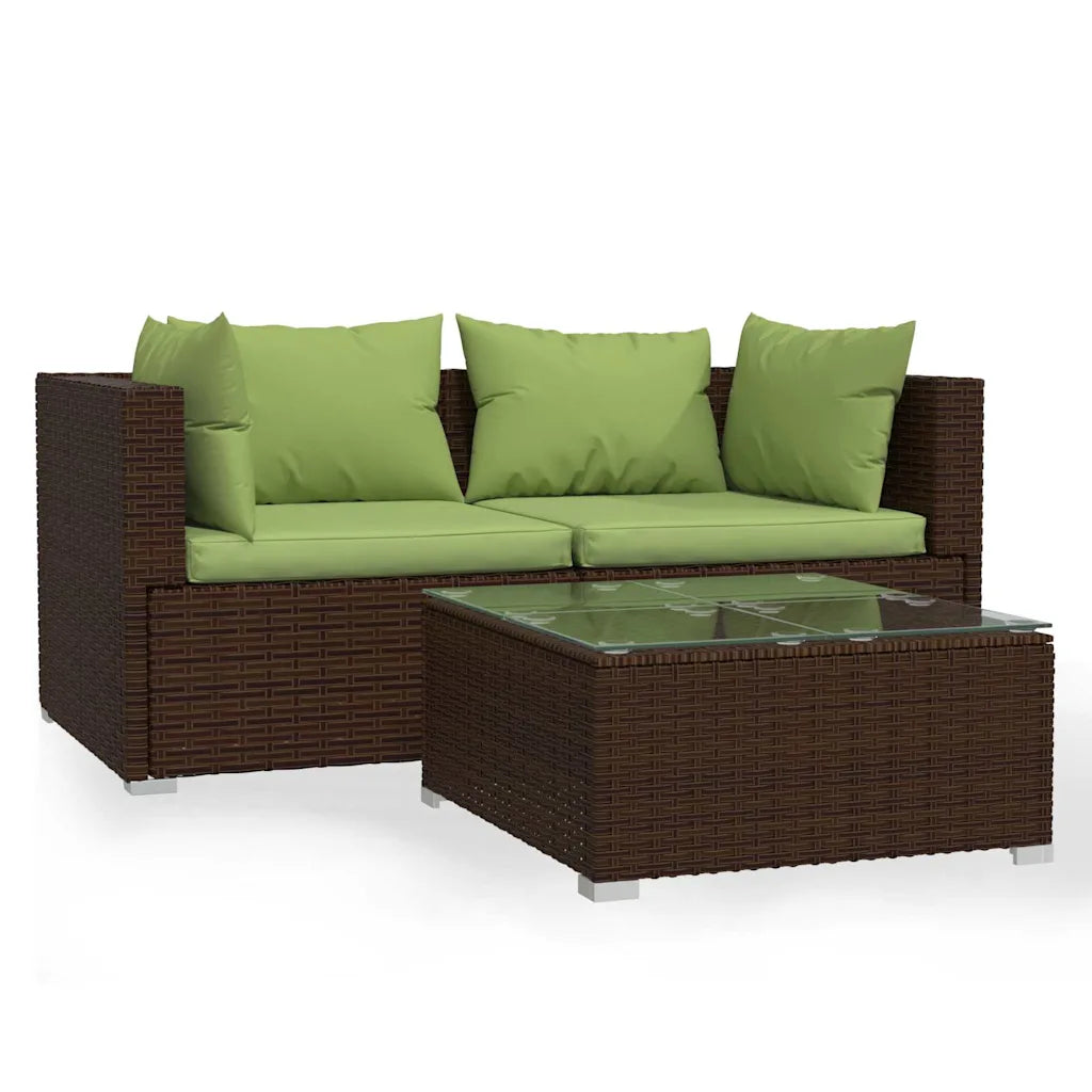 Set soggiorno da esterno in polyrattan marrone con cuscini verdi e tavolino