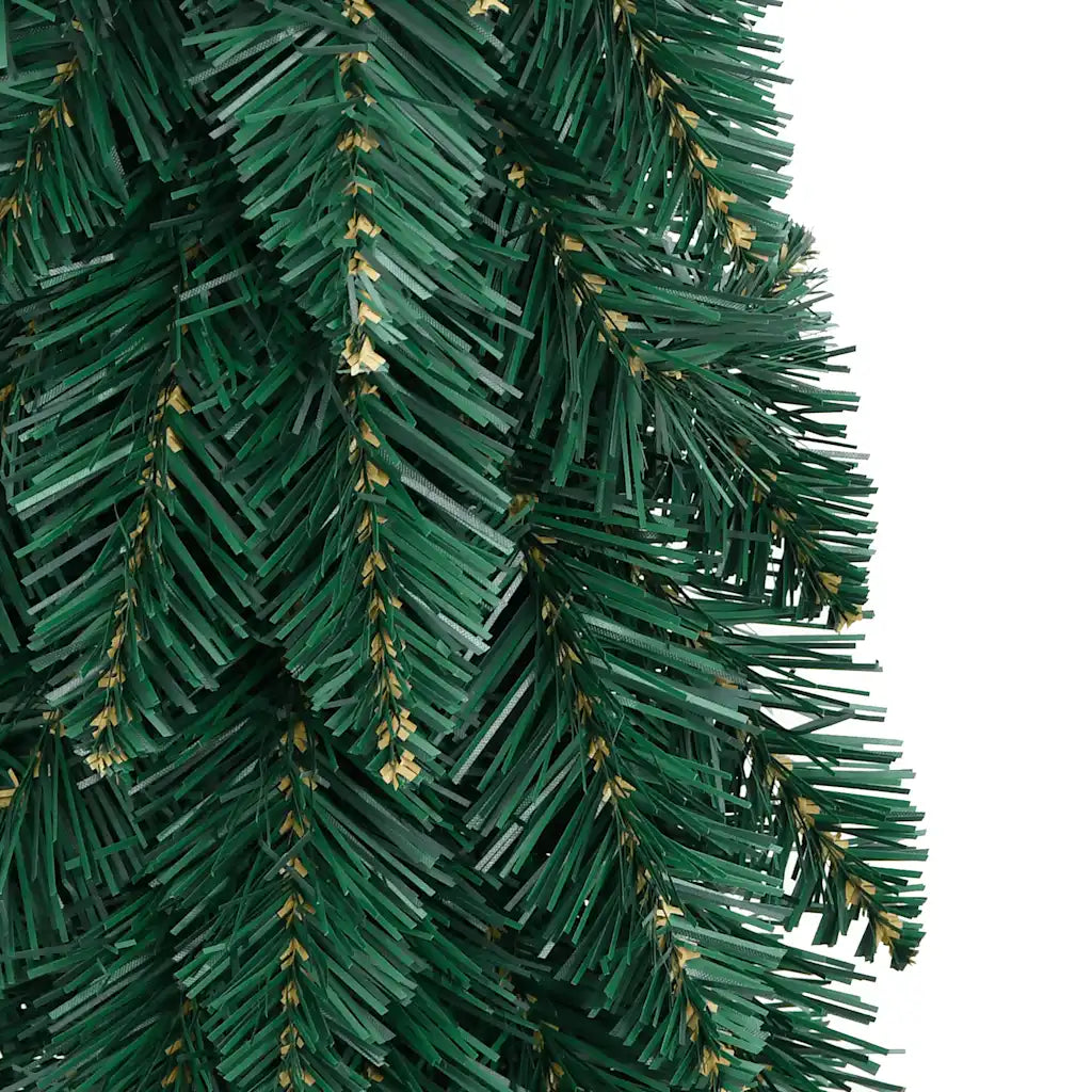Dettaglio rami dell’albero di Natale artificiale verde con luci LED