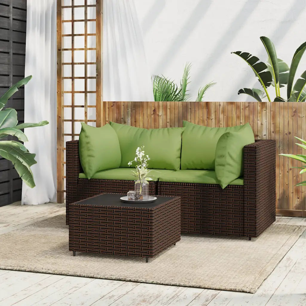 Divano angolare da giardino in polyrattan marrone con cuscini verdi e poggioli