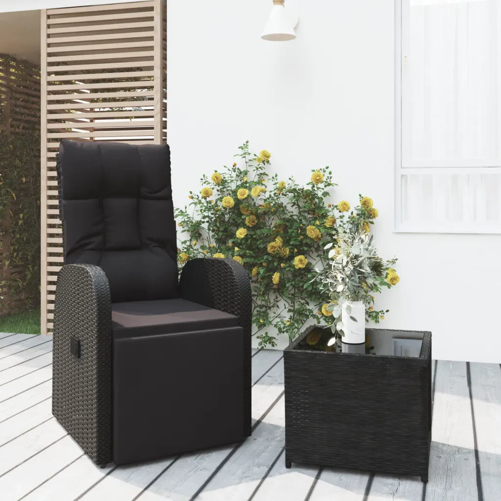 Poltrona e tavolino da giardino in polyrattan nero, con cuscino imbottito