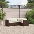 Divano da giardino in polyrattan marrone con cuscini bianchi e seduta angolare