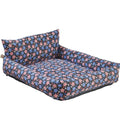 Cuccia imbottita per animali blu con stelle multicolori e bordi rialzati