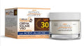 Crema viso solare SPF 30 in barattolo e confezione, con acido jaluronico