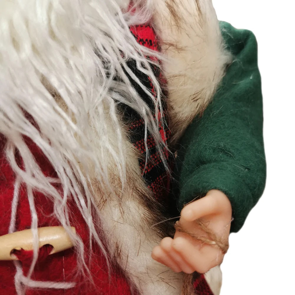 Statuina di Babbo Natale, mano con sacchetto e dettagli dell’abito rosso e verde