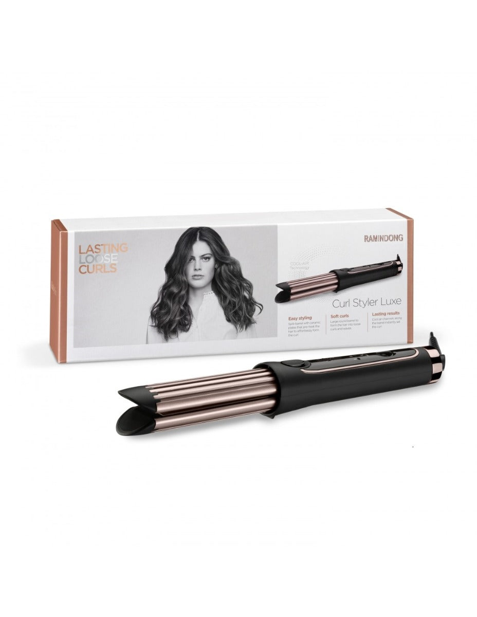 Styler arricciacapelli con doppio cilindro nero e rivestimento rosa, nella confezione