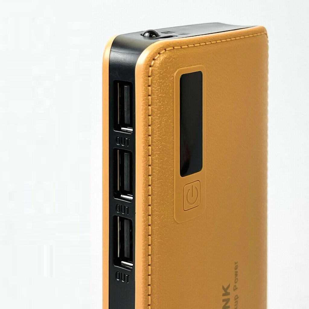 Power bank oro con 3 porte USB e pulsante di accensione sul lato