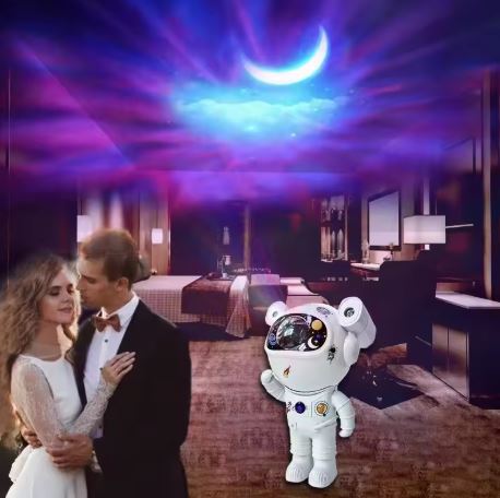 Proiettore astronauta bianco con proiezioni stellari e luce lunare
