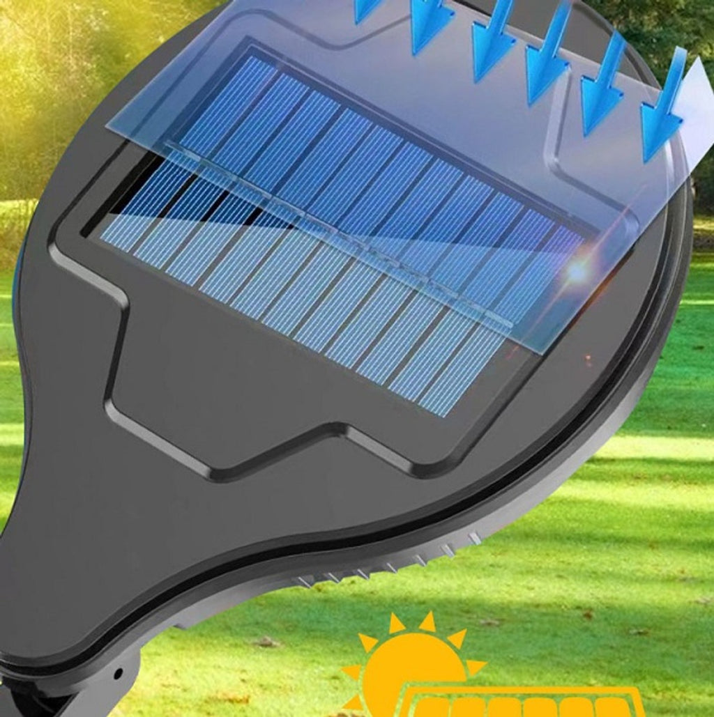 Testa del proiettore solare con pannello solare blu a griglia e scocca nera.