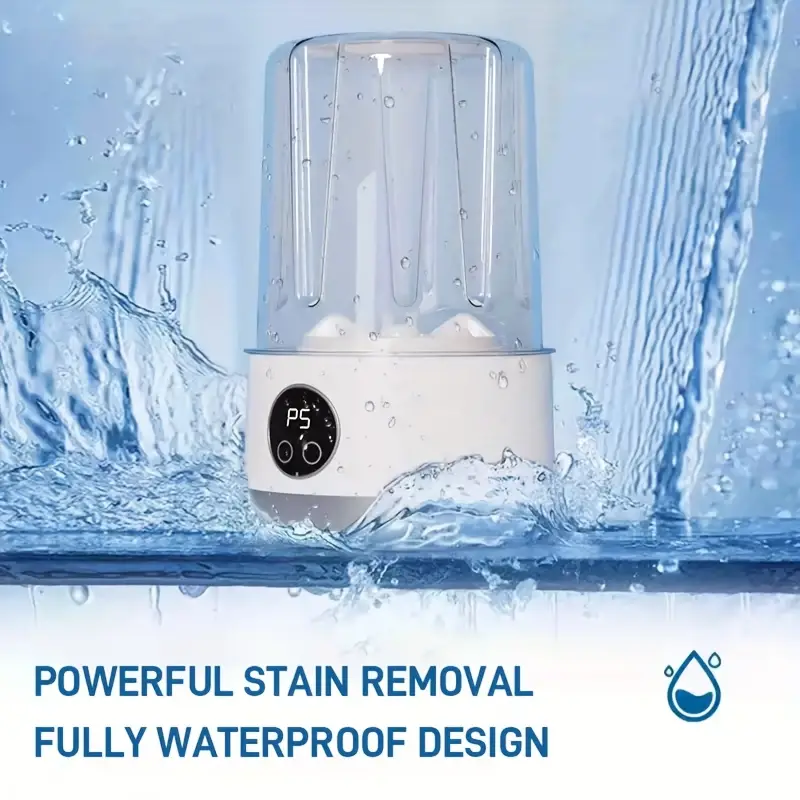 Mini lavatrice portatile bianca con coperchio trasparente e spruzzi d’acqua