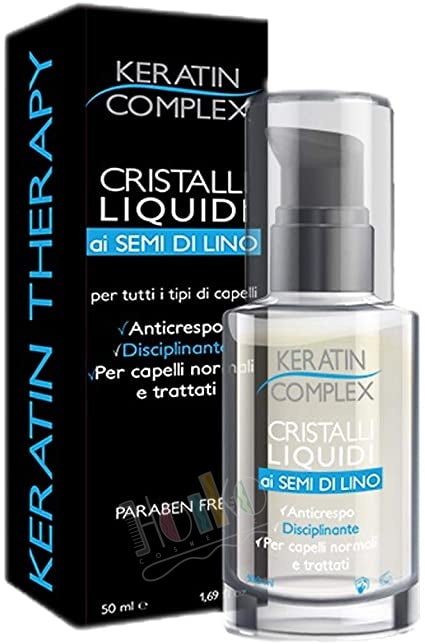 Trattamento liquido per capelli in flacone trasparente con etichetta blu e scatola nera
