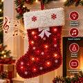 Calza di Natale rossa con bordo bianco soffice, fiocchi di neve e luci LED accese