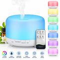 Diffusore di aromi a ultrasuoni bianco con coperchio blu e telecomando.
