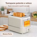 Tostapane a 2 fette bianco con slot illuminato e toast dorato in cottura